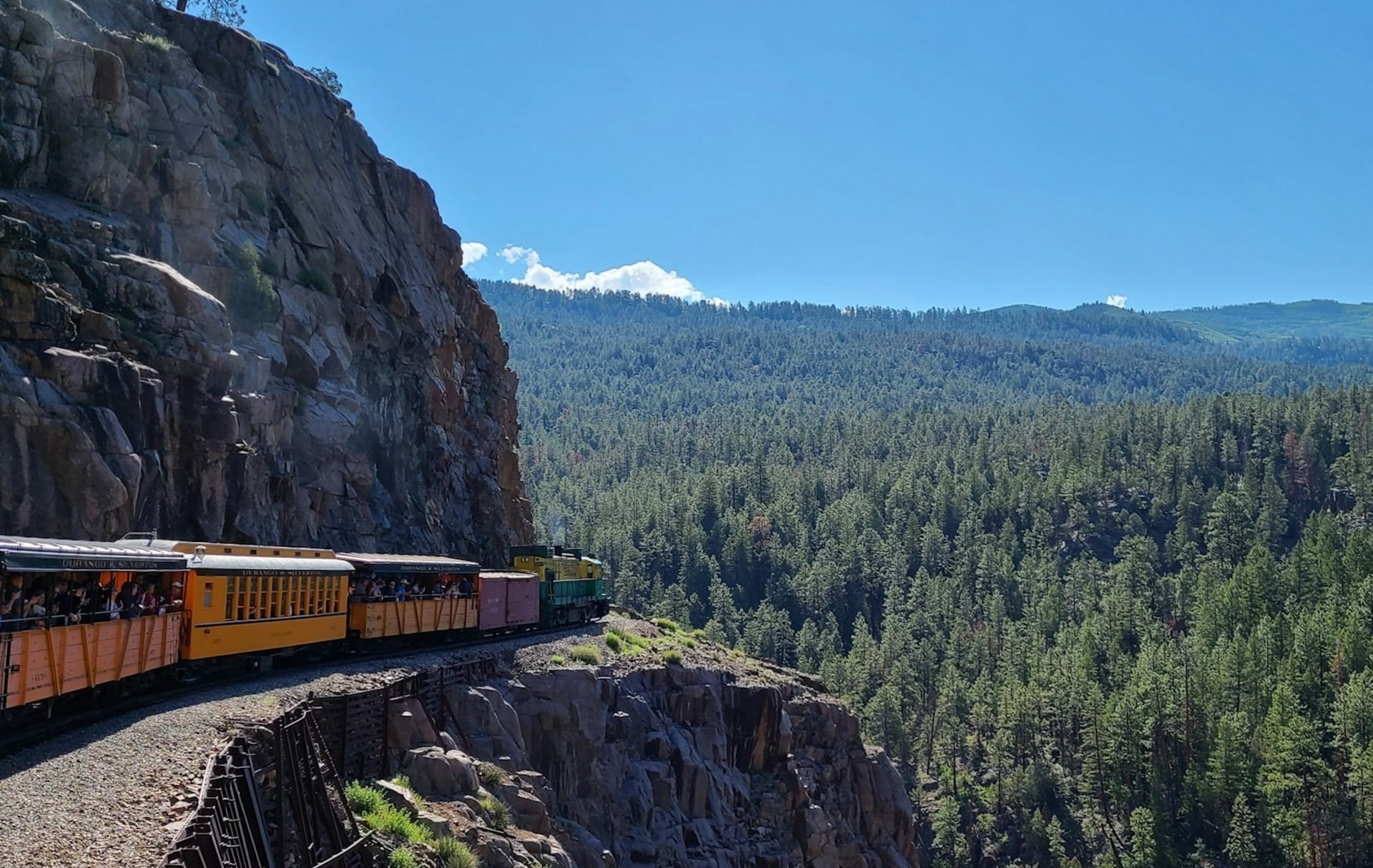 Durango & Silverton Narrow Gauge Railroad on the edge of rock mountains