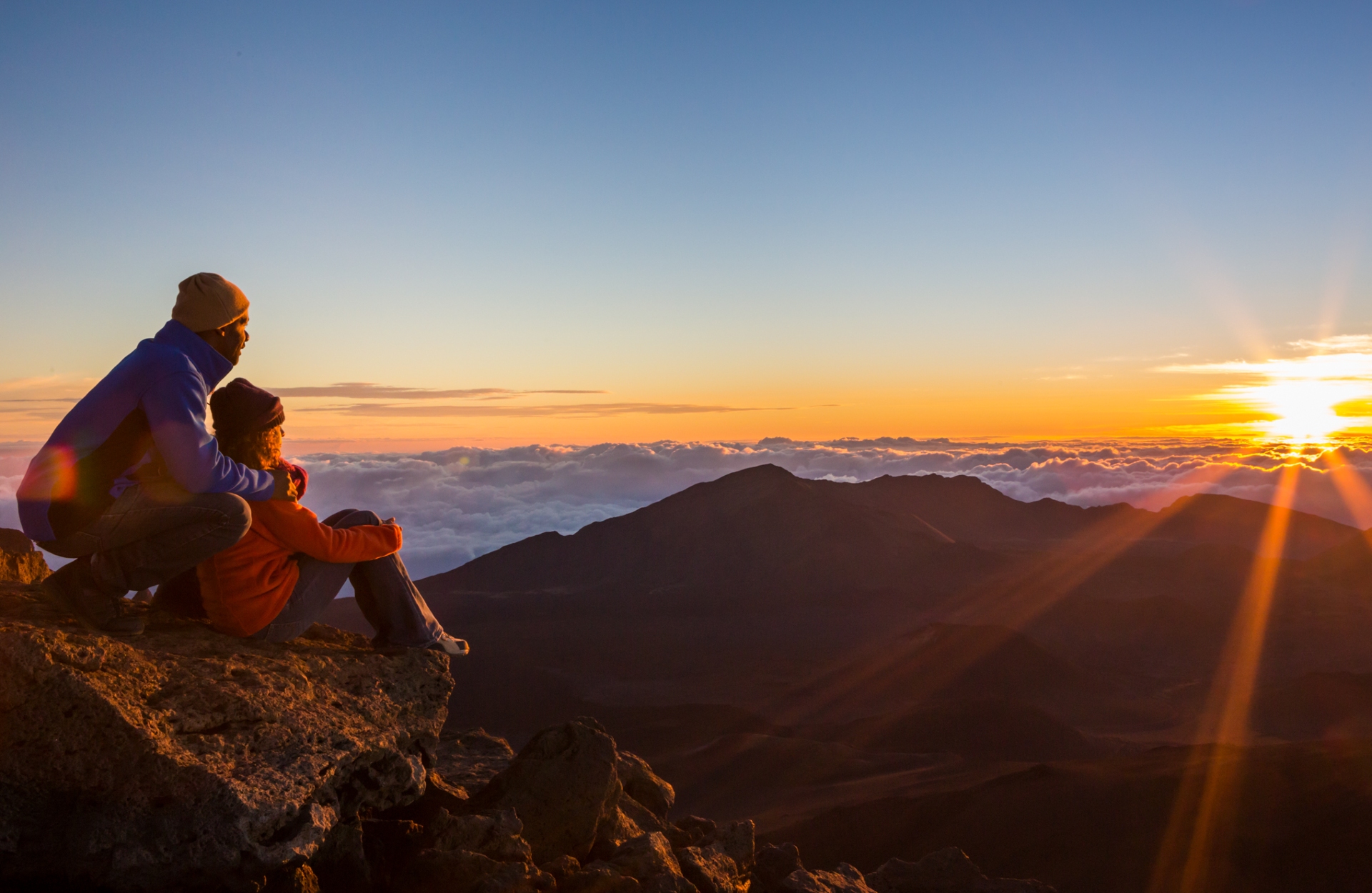 Haleakala Sunrise watching the sun rise over the clouds & mountains