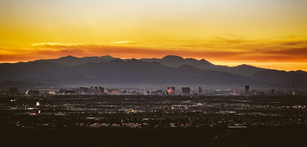 Las Vegas skyline with stunning sunset behind the mountains