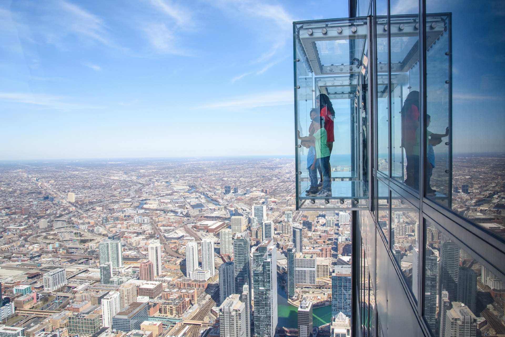 Side view of Skydeck towering over Chicago