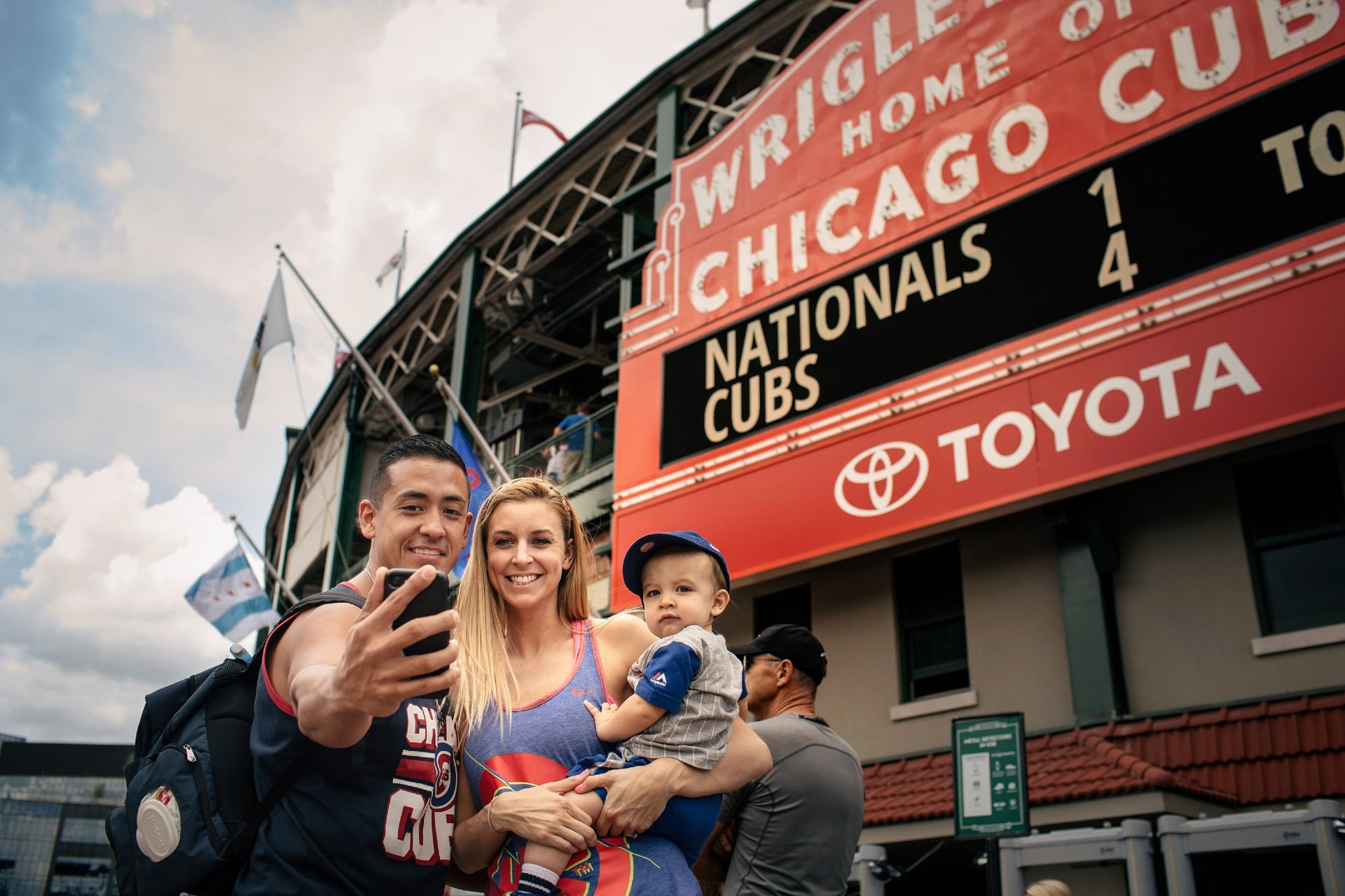 Family standing outside Wrigley Field