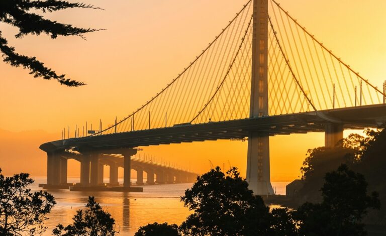 Bay Bridge San Francisco with stunning yellow sunset