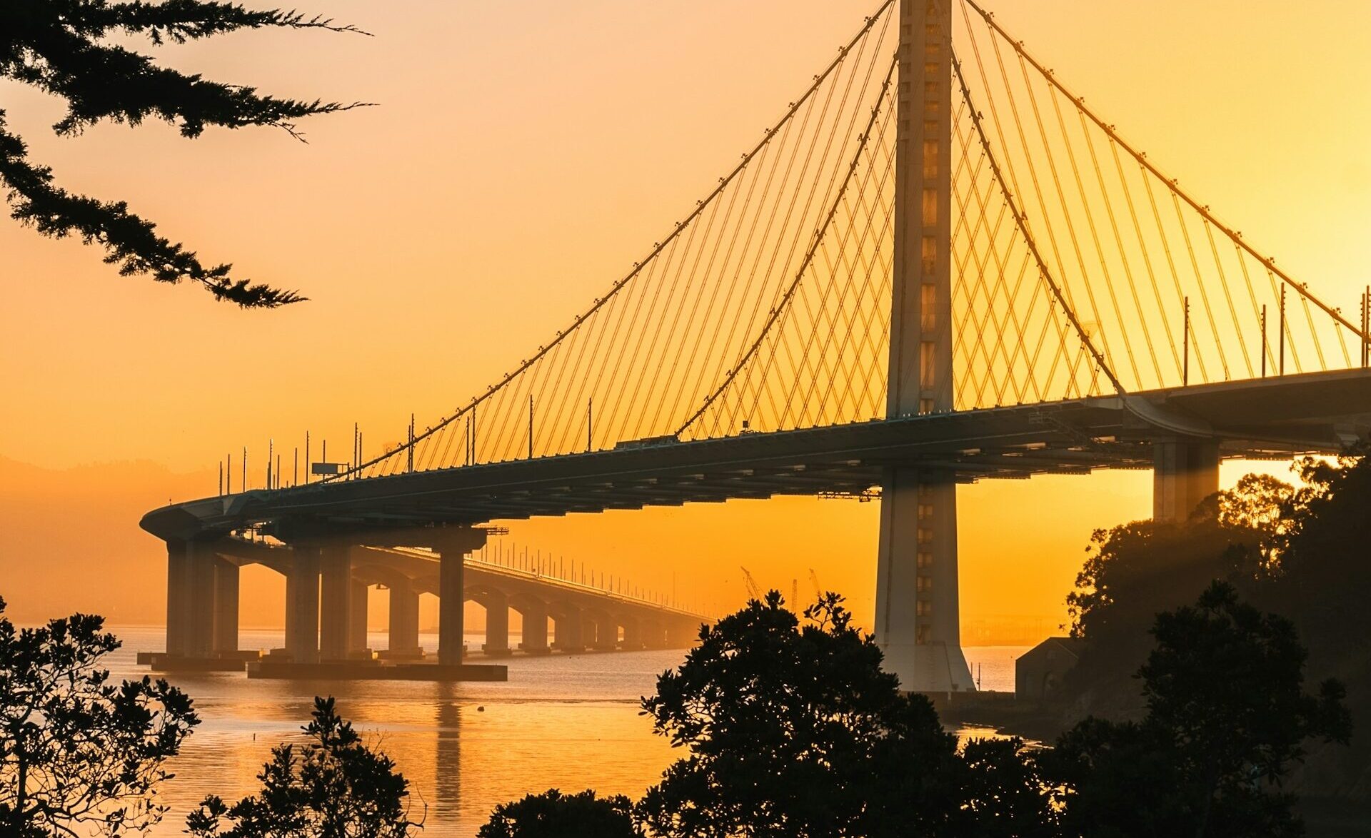 Bay Bridge San Francisco with stunning yellow sunset