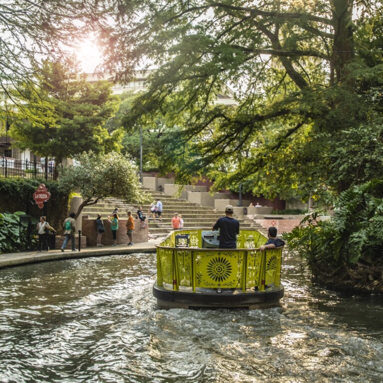 San Antonio River Walk showing the boat ride along the river