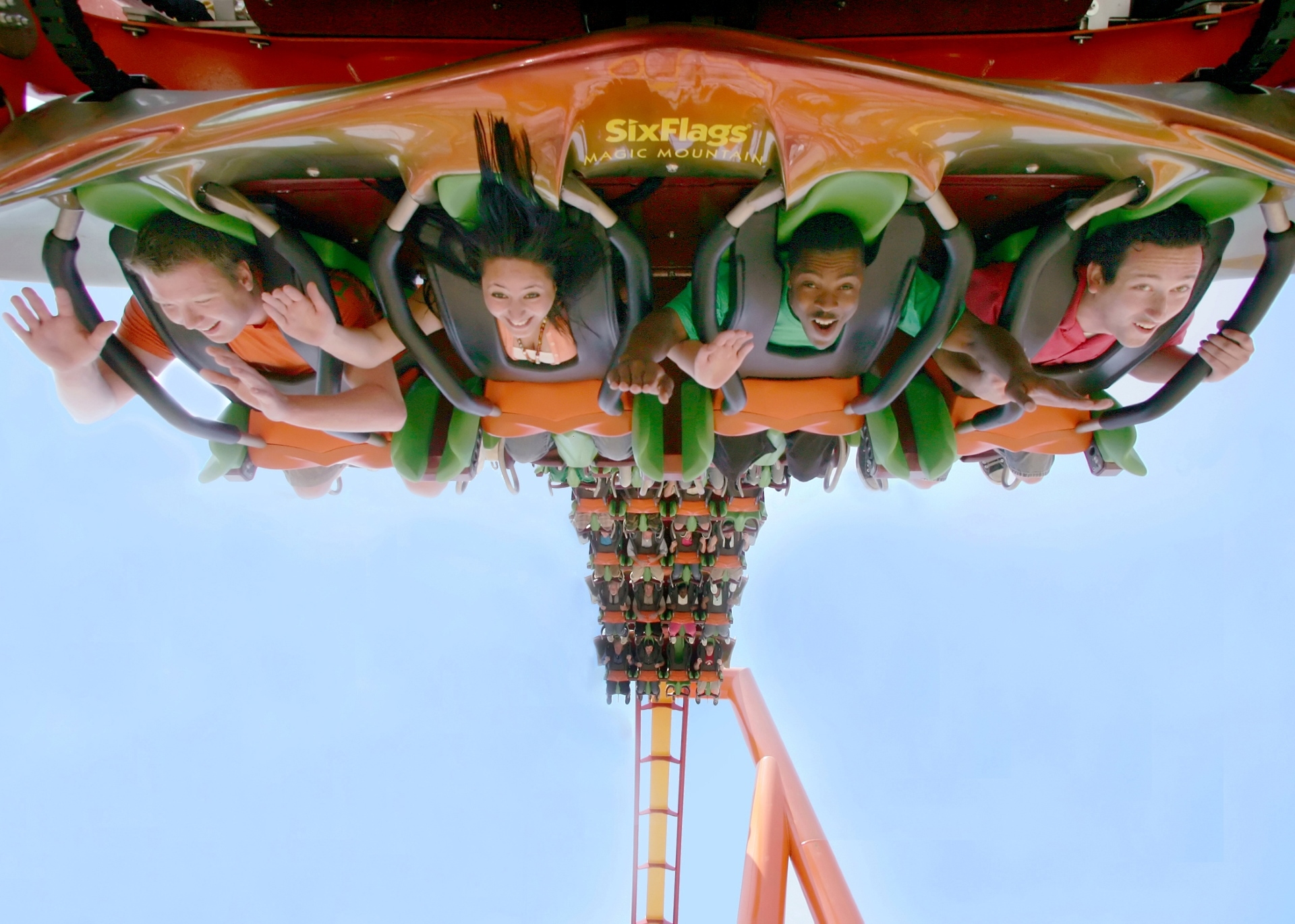 Thrill-seekers experience gravity-defying excitement on a roller coaster at Six Flags Magic Mountain in Los Angeles.