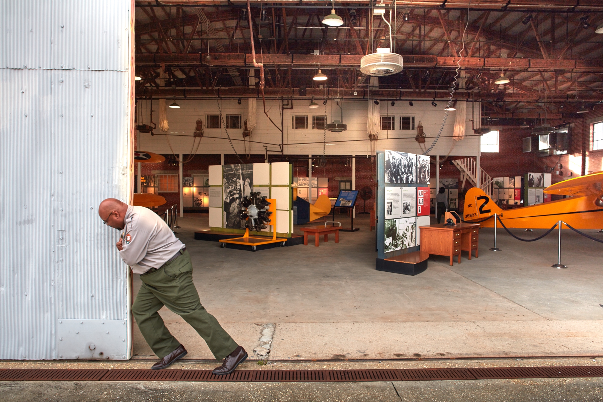 Opening the hangar door at Tuskegee Airmen National Historic site