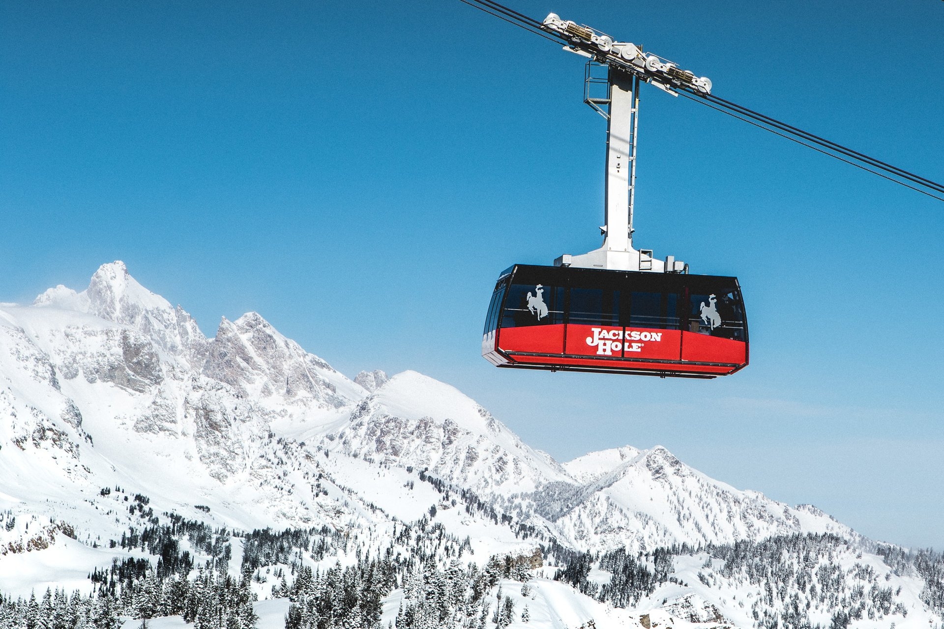 Jackson Hole gondola going up the mountain for skiing & fantastic views of Jackson Hole