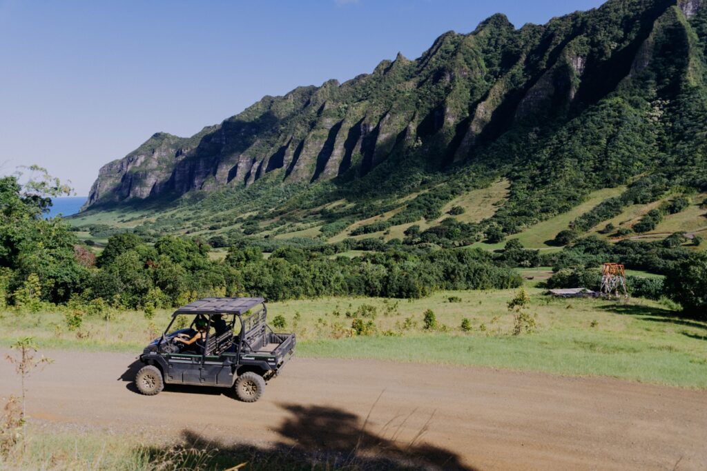 Kualoa Ranch riding along the dirt road in a buggy