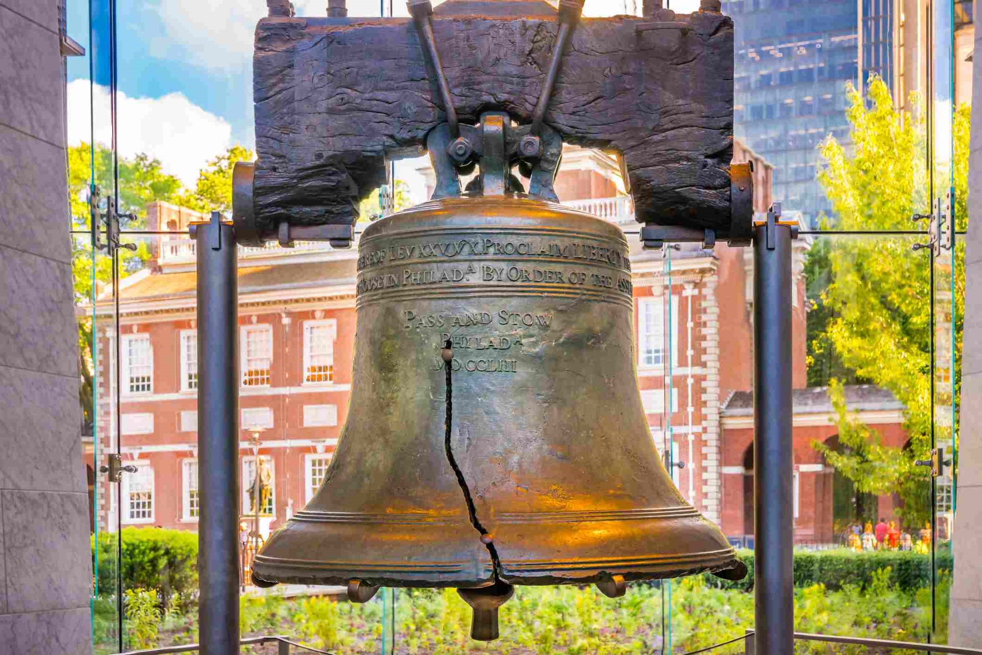 Liberty Bell Philadelphia showing the historical crack in the bell and city Hall in the background