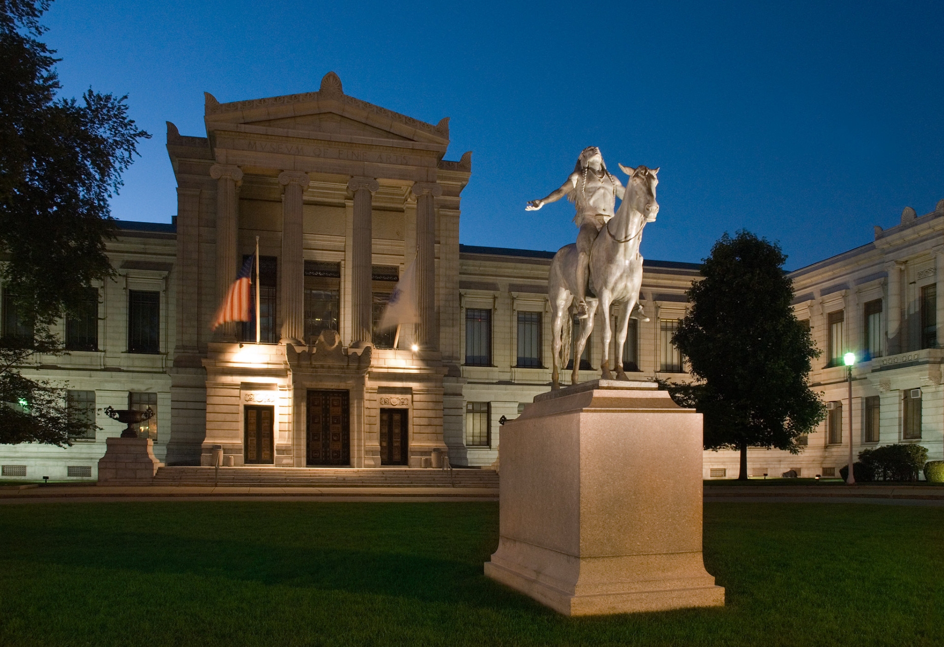 Museum of Fine Arts outside view at night showing the statue out the front of the museum