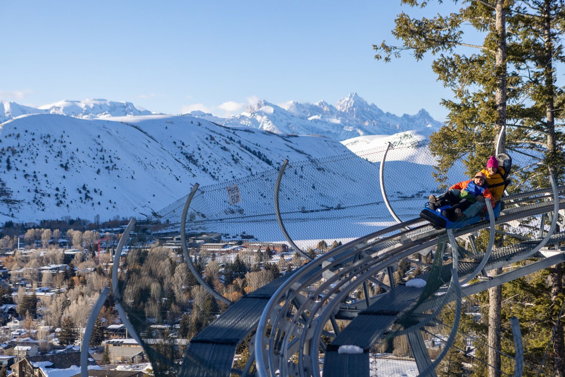 Snow King Mountain Resort Coaster having fun in the snow while enjoying the stunning views of the mountains in Wyoming