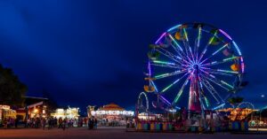 Wyoming State Fair showing the big Ferris Wheel lit up with colourful lights