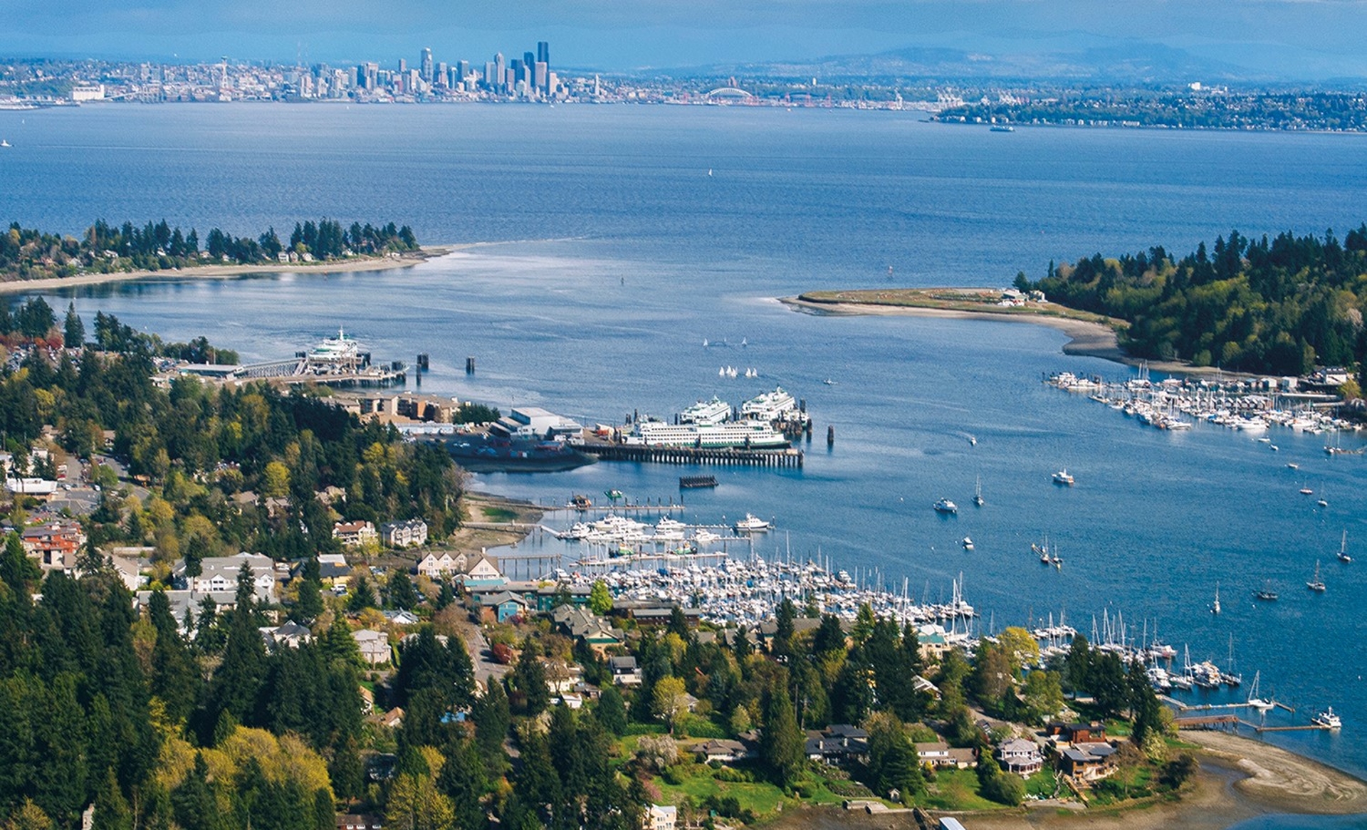 Bainbridge Island an arial view of the marinas and the city view of Seattle in the distance