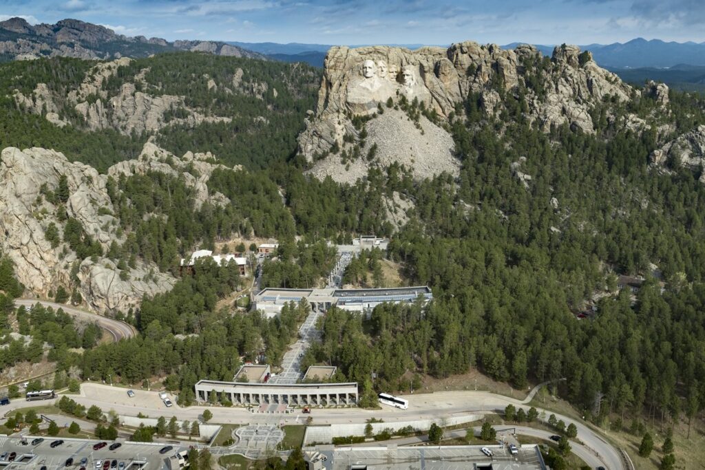 Mt Rushmore from a distance show just how high up this monument is and the attraction site below