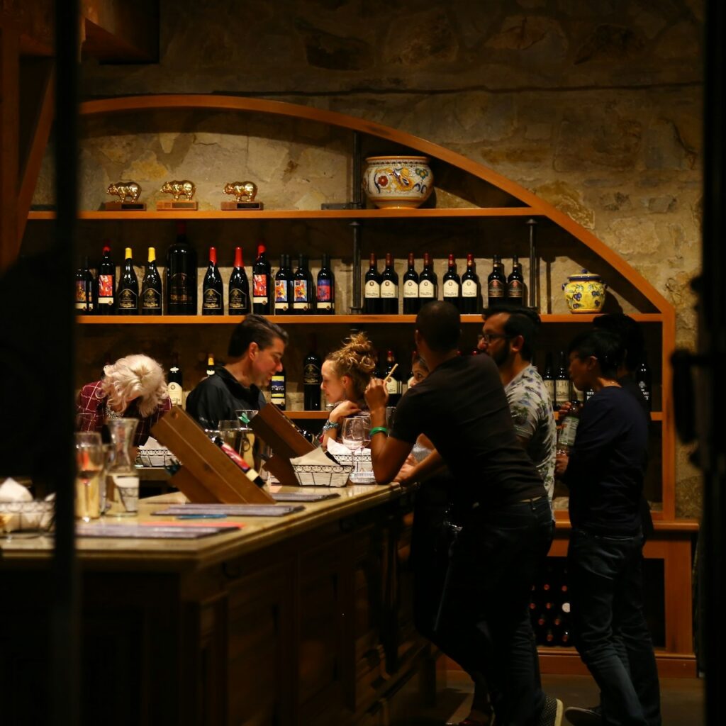 People tasting wine in Napa Valley Wine Caves Image by oleksandr gamaniuk iWmC 38Q6Hk unsplash e1714782890703