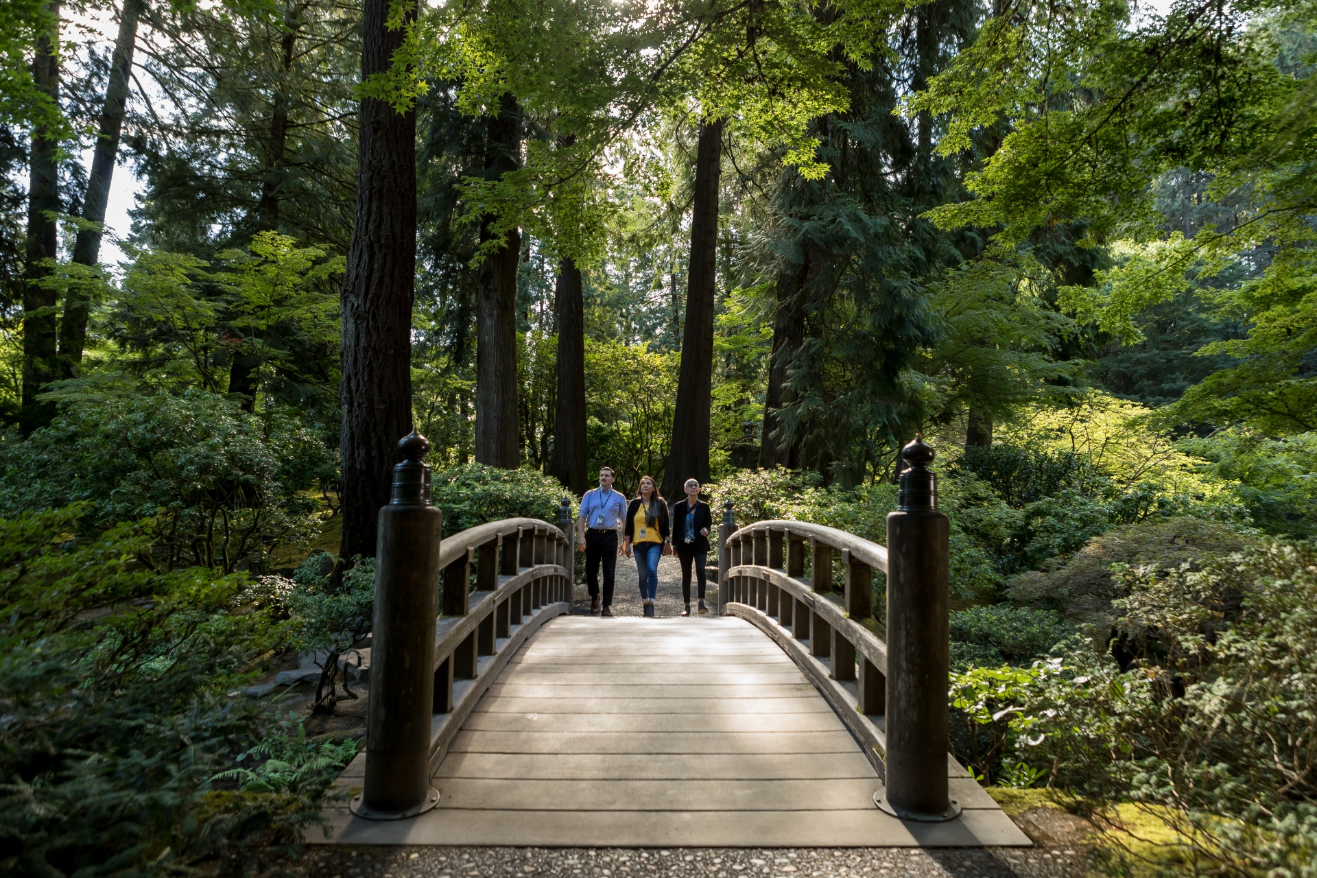 Walking across the bridge at the Portland Japanese Garden