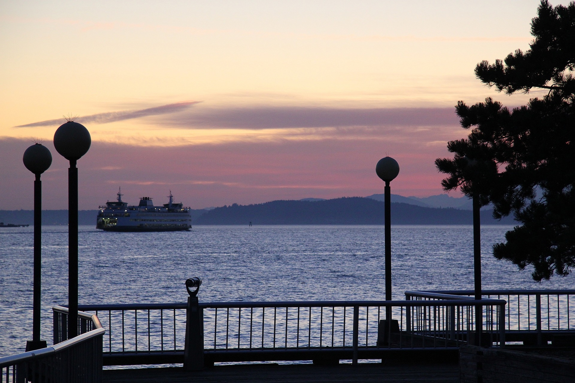Seattle Ferry from City awesome shot from the viewing platform of the ferry at sunset