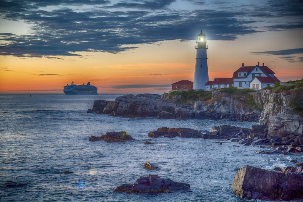The Viking Cruise Line’s Norwegian Dawn approaching Portland Head Light in Portland, Maine. Cape Elizabeth