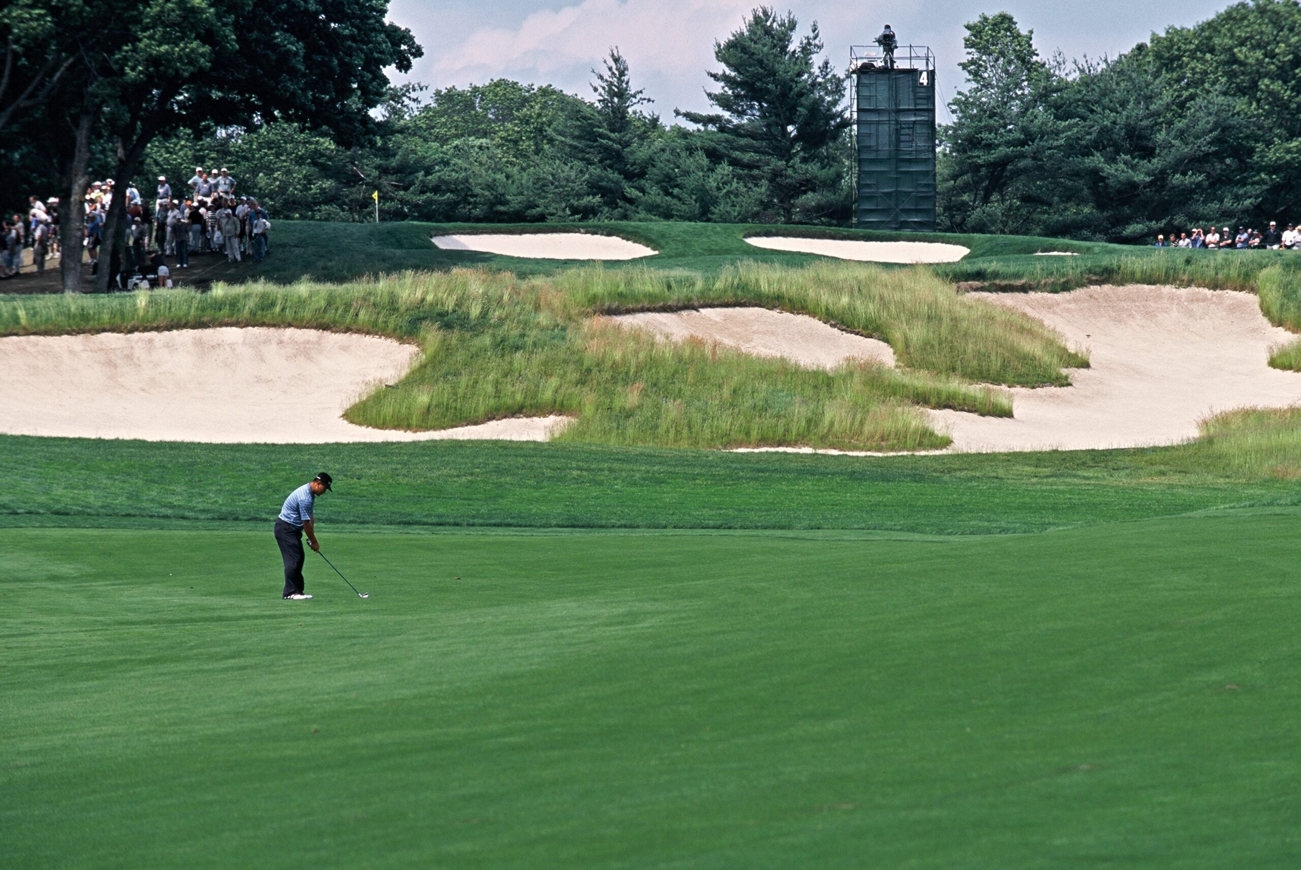 Bethpage Golf Course with a lone player with people watching