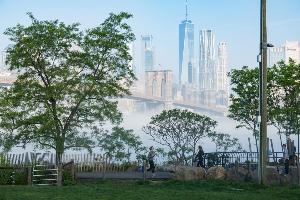 Brooklyn Bridge Park, Dumbo, Brooklyn with people taking a morning run