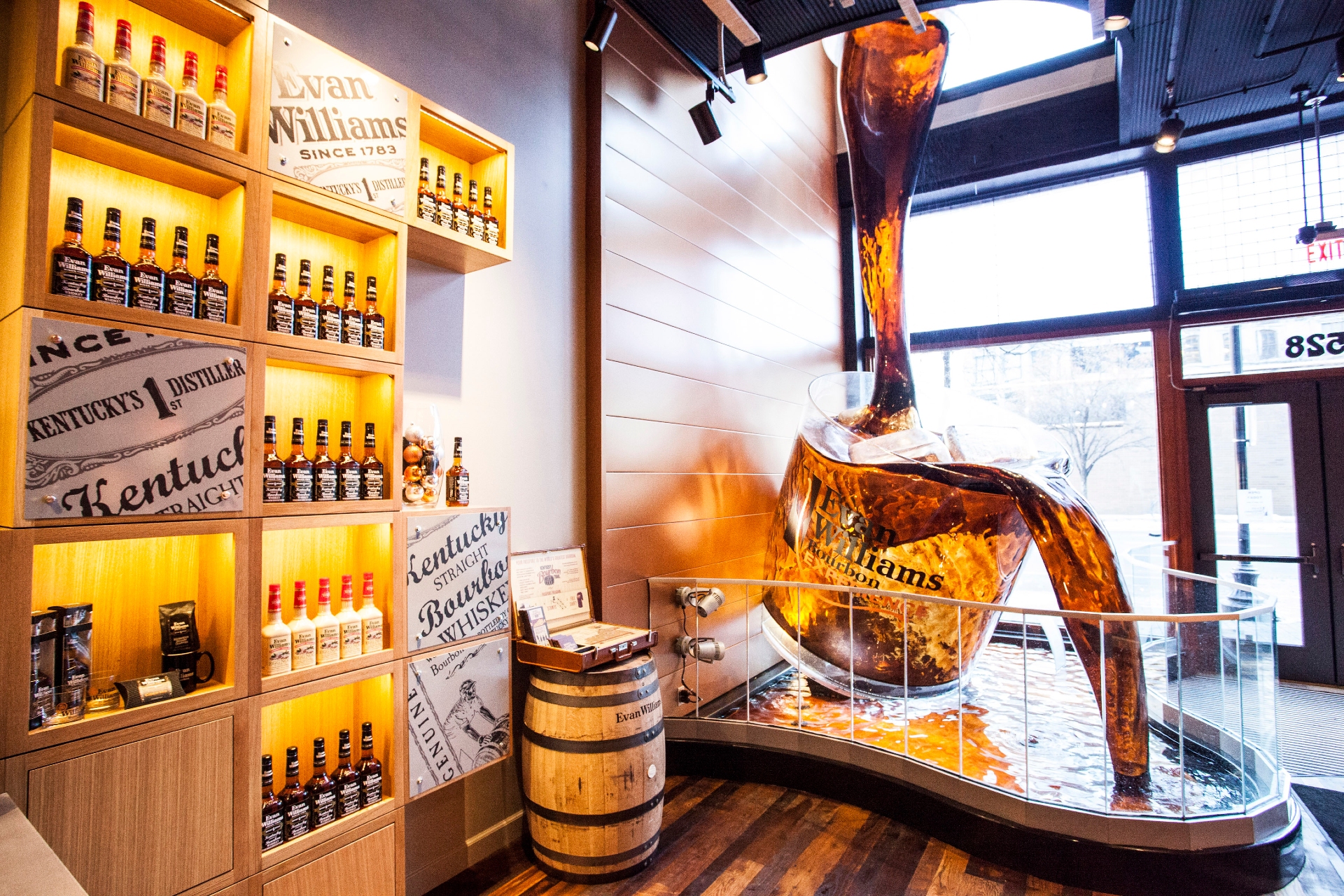 Evan Williams Bourbon Experience with a unique shop with a bourbon fountain in the shop window