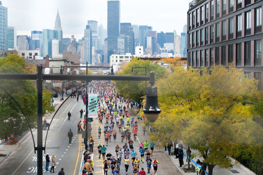 NYC Marathon with people running in the streets