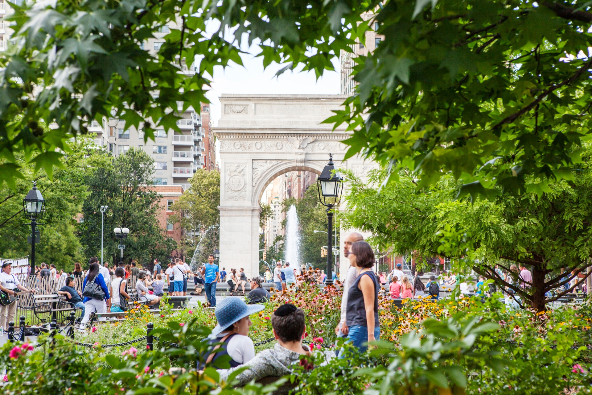West Village in New York City showing the park with people enjoying the surroundings