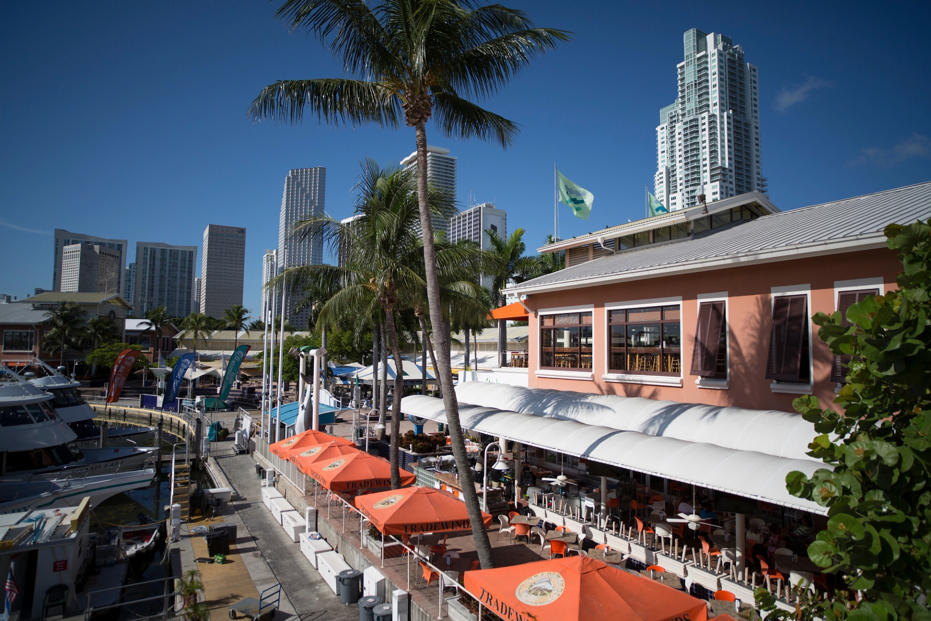 Bayside Marketplace with Downtown high rises Miami Image By Greater Miami Convention Visitors Bureau