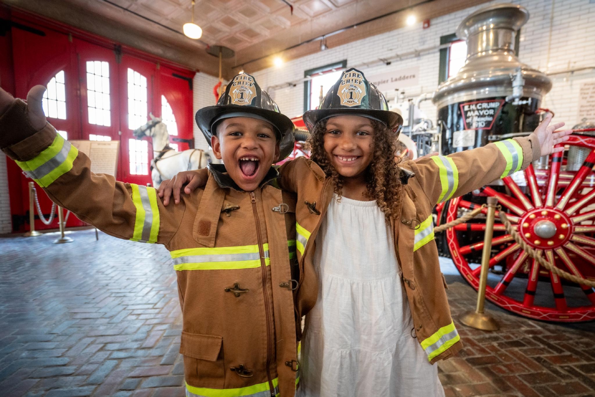 Kids playing at the Fire Museum of Memphis Credit Creation Studios Memphis Tourism