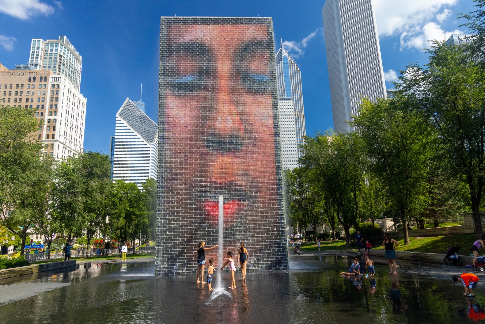 Crown Fountain Millennium Park with water coming out of the mouth of the image