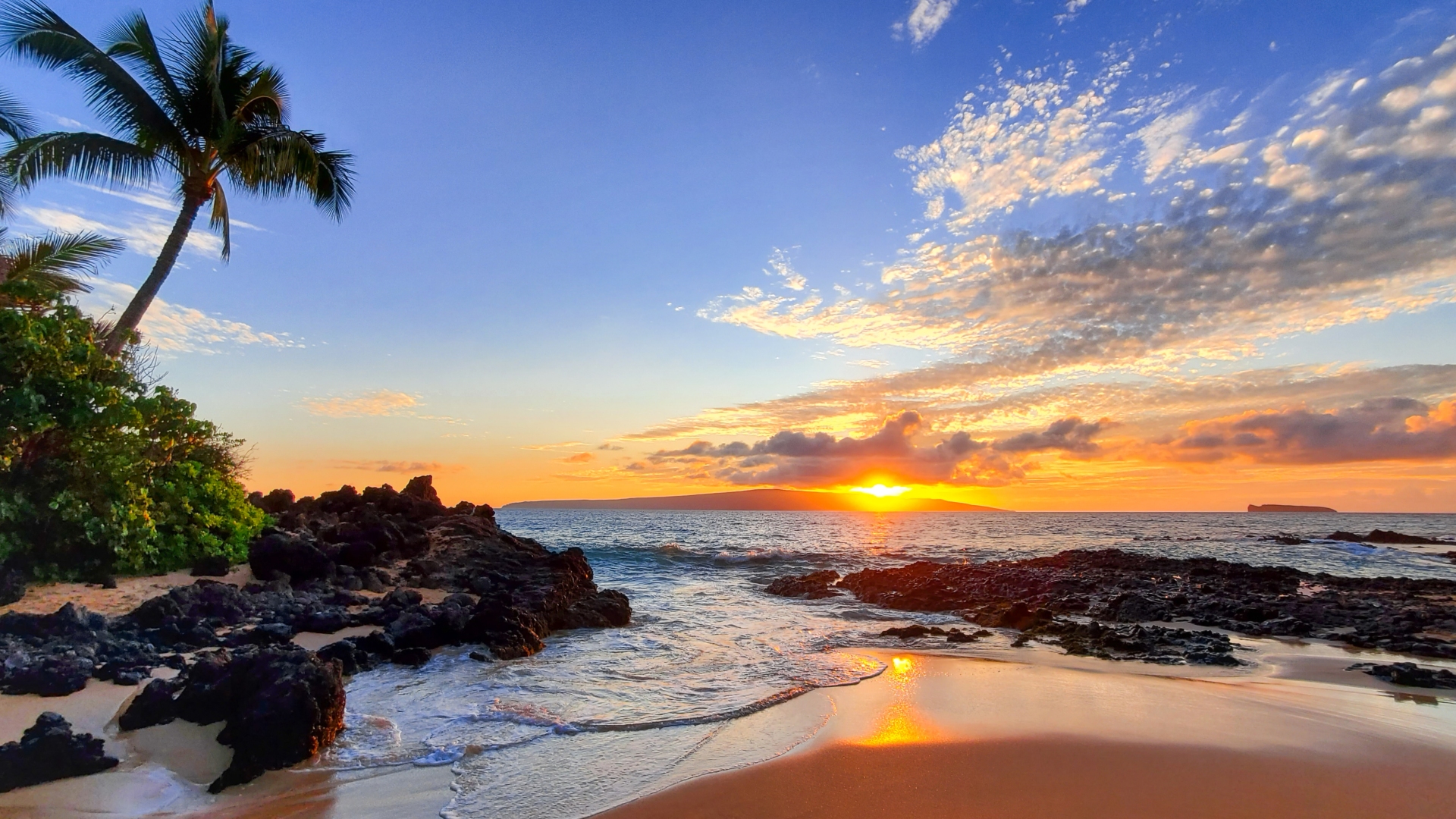 Makena Secret Beach at sunset in Maui HI Image purchased from iStock 1196861791