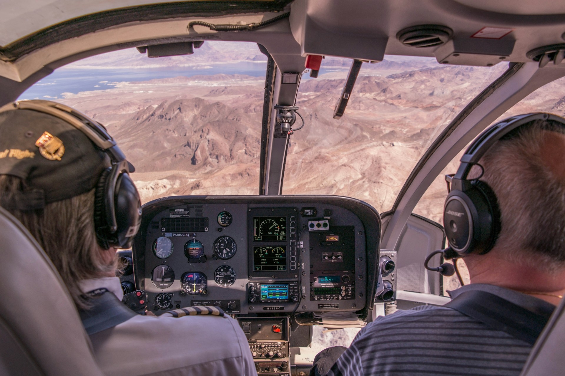 Helicopter Grand Canyon showing the inside view of the helicopter and the view of the canyon