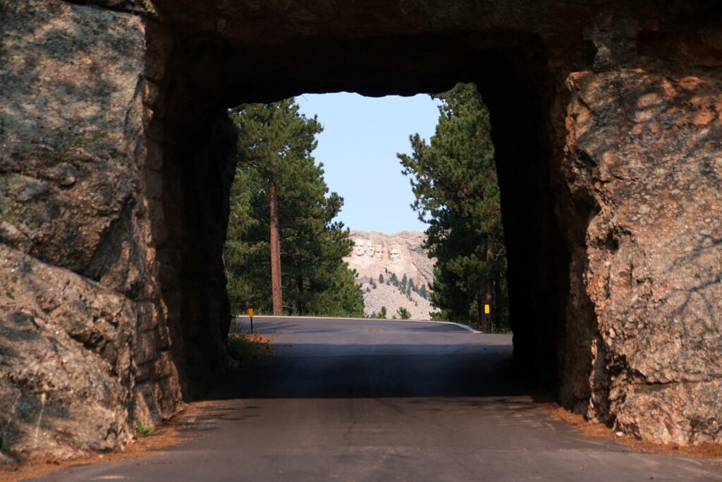 Iron Mountain Road through the tunnel with Mt Rushmore in the background South Dakota Image purchased from iStock 613324610