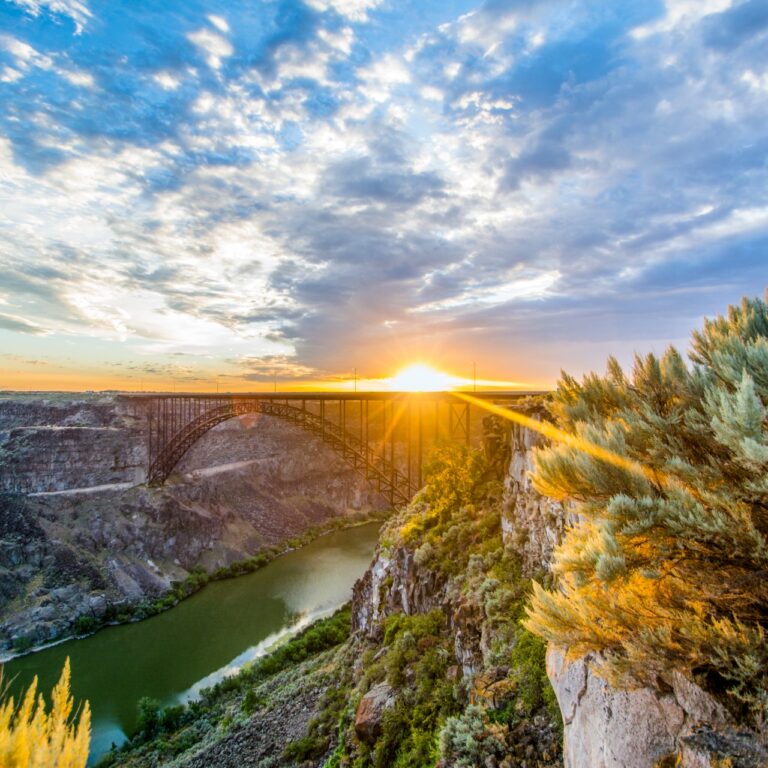 Perrine Bridge twin falls in Idaho from a lookout point overlooking the canyon river and bridge with the sunsetting