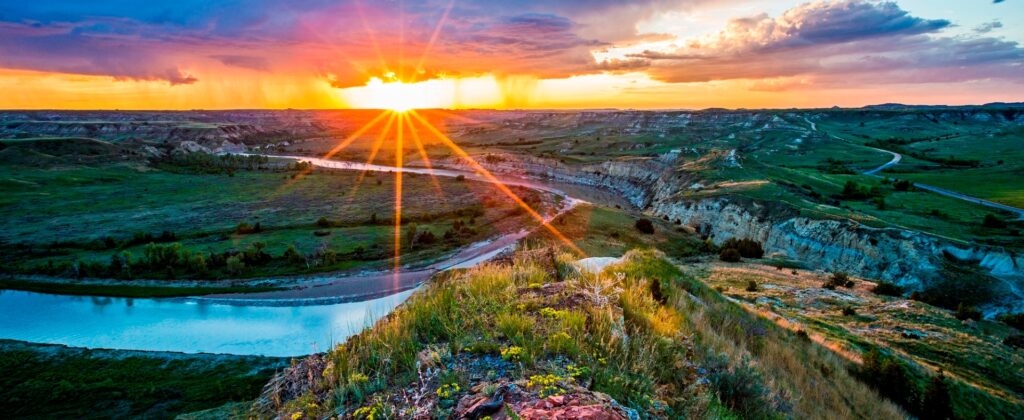Theodore Roosevelt National Park at sunset overlooking the park & river