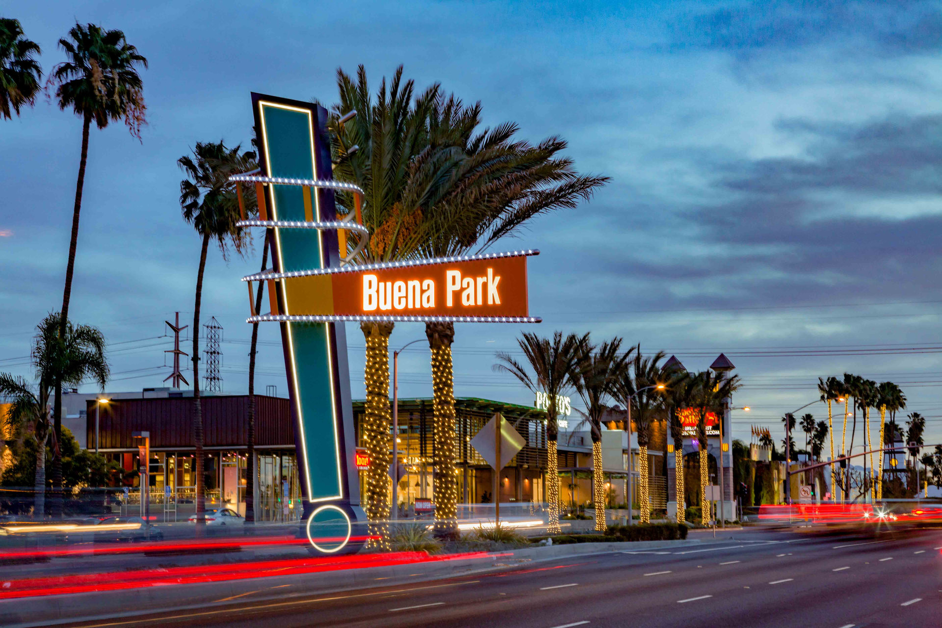 Buena Park median sign at dusk with portos