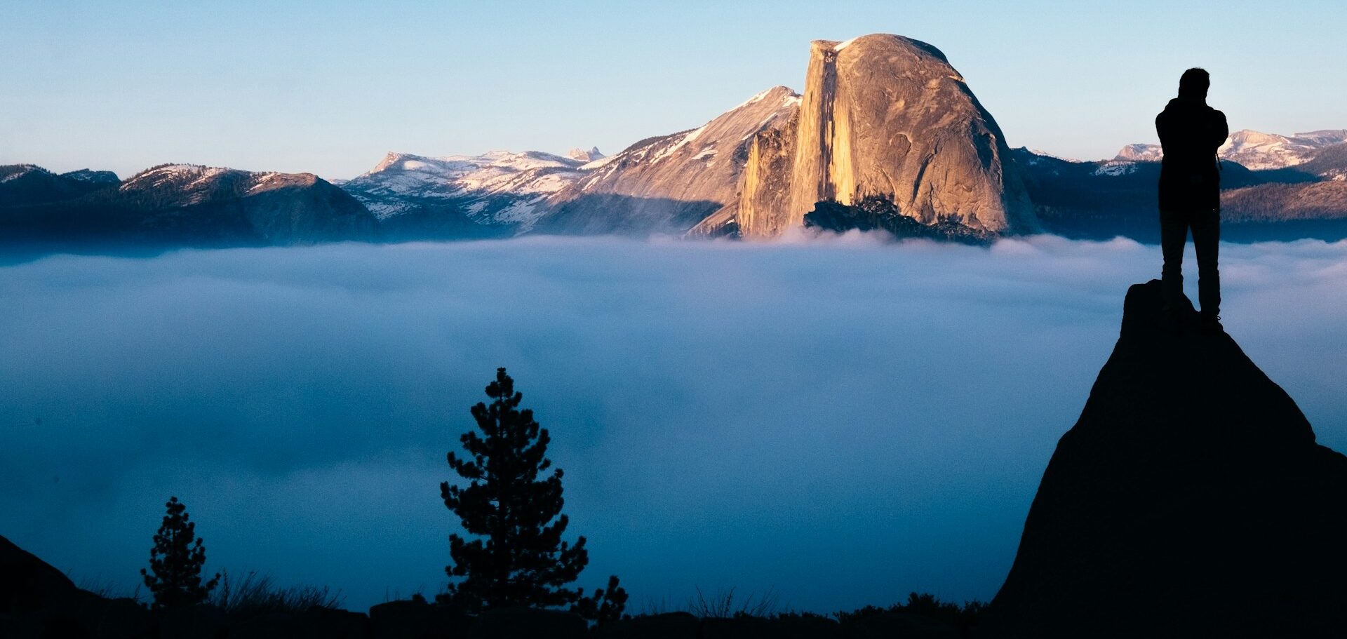 Yosemite foggy evening with the half dome peaking through CA Image By john gibbons unsplash edited