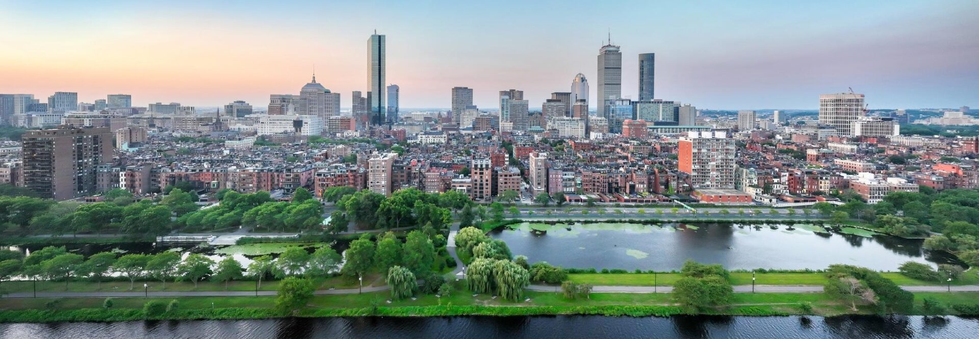 Boston Skyline on a clear summers day showing the green foliage in the Boston Common